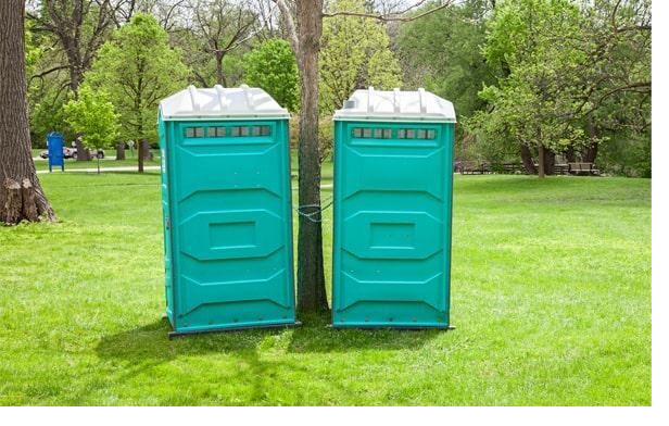 Portable restrooms set up for a corporate outdoor event