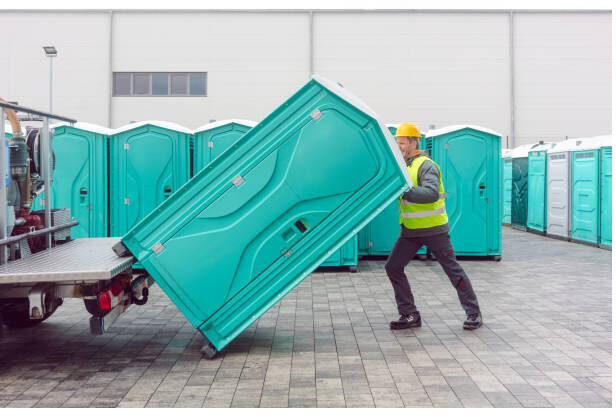 Deluxe portable toilet unit being delivered on a service trailer