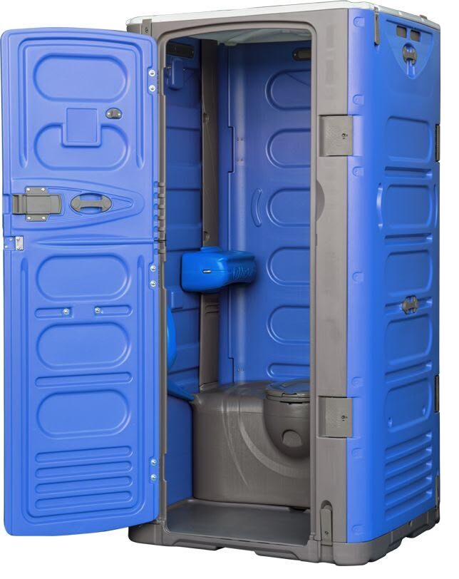 Open interior view of an ADA accessible portable toilet showing grab bars and turning space